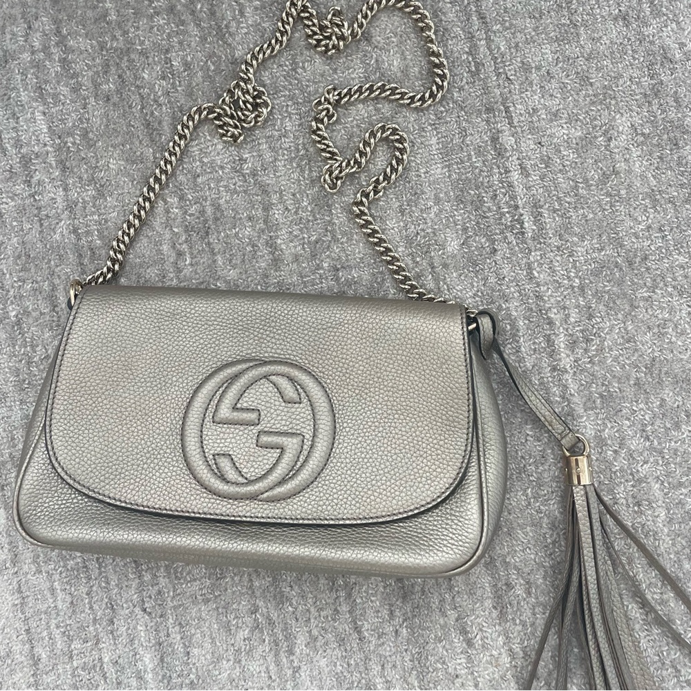 Gucci silver bag with tassel